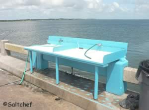 fish cleaning table at george crady fishing pier