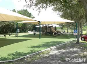 shaded playground at riverbreeze park