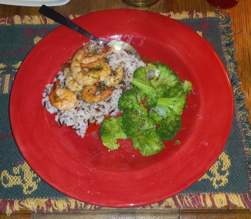 spicy baked shrimp with rice and vegetable