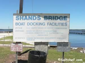 sign at old shands bridge fishing pier