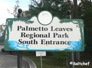 entrance sign to palmetto leaves south