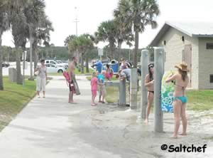rinse off at the outdoor showers at main beach park