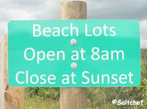 guana beaches sunset close sign