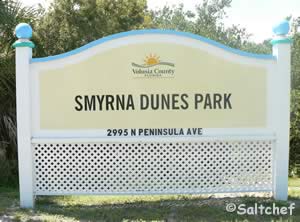 sign at entrance to smyrna dunes beach park